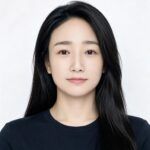 Contact Us 4 Professional woman with long black hair in a black shirt for cleaning equipment.