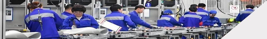 ABOUT US 5 Workers assembling cleaning appliances at Union Technologies factory.