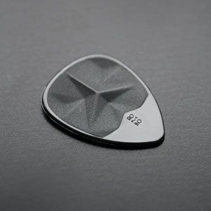 Cleaning appliance OEM guitar pick with embossed logo and model number.