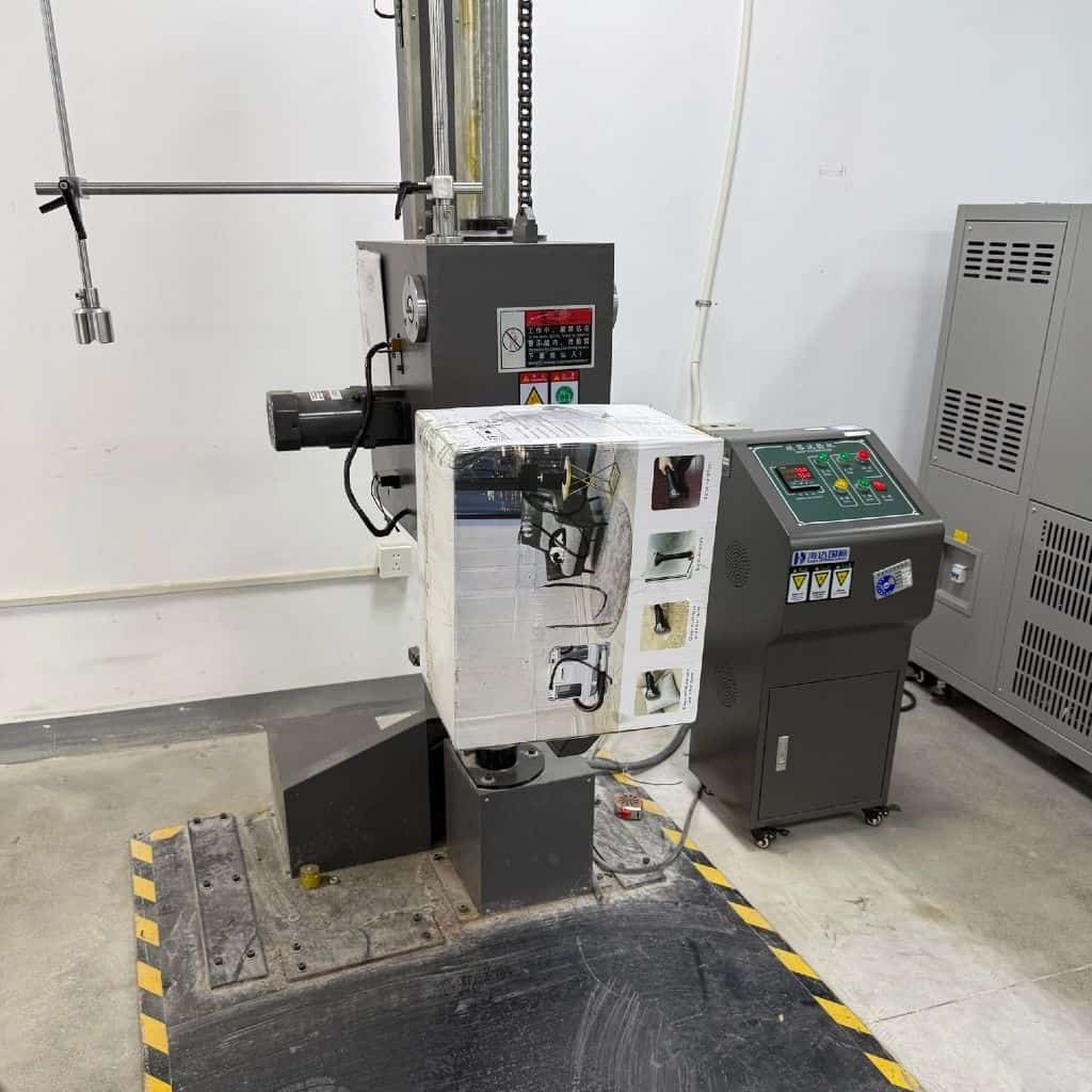 Visit Our Factory 6 Testing machine for cleaning appliances in factory setting.